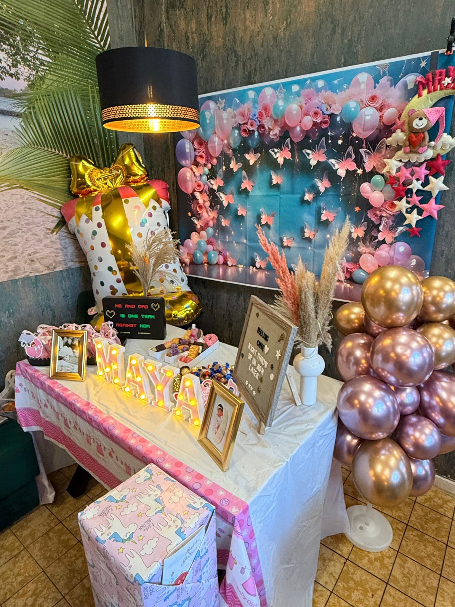 Birthday party setup with balloons and decorations